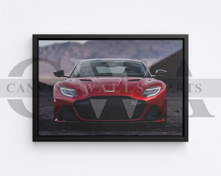 Framed artwork of a red sports car on a white wall with 'CANVAS WALLS' branding.