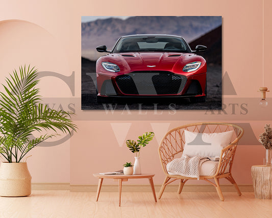 Red sports car on a wall art canvas in a living room setting with a chair and plant.